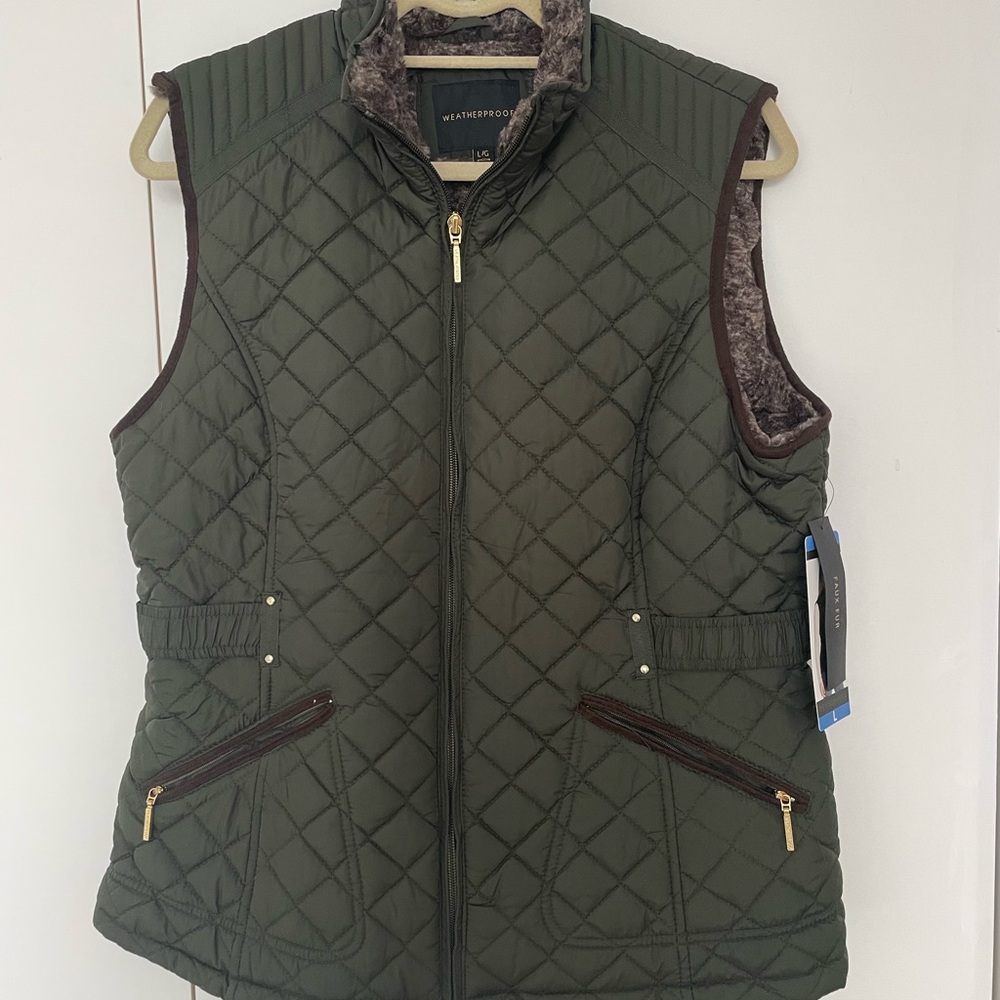 Weatherproof faux fur lined vest. NWT